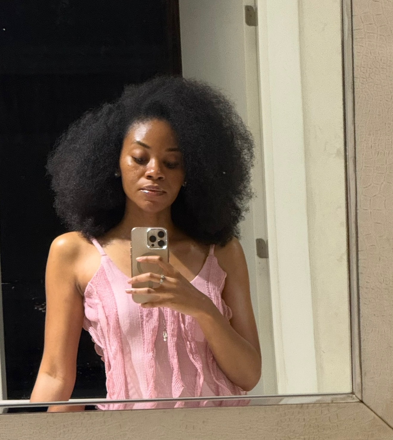 Daisy with a full, voluminous afro today