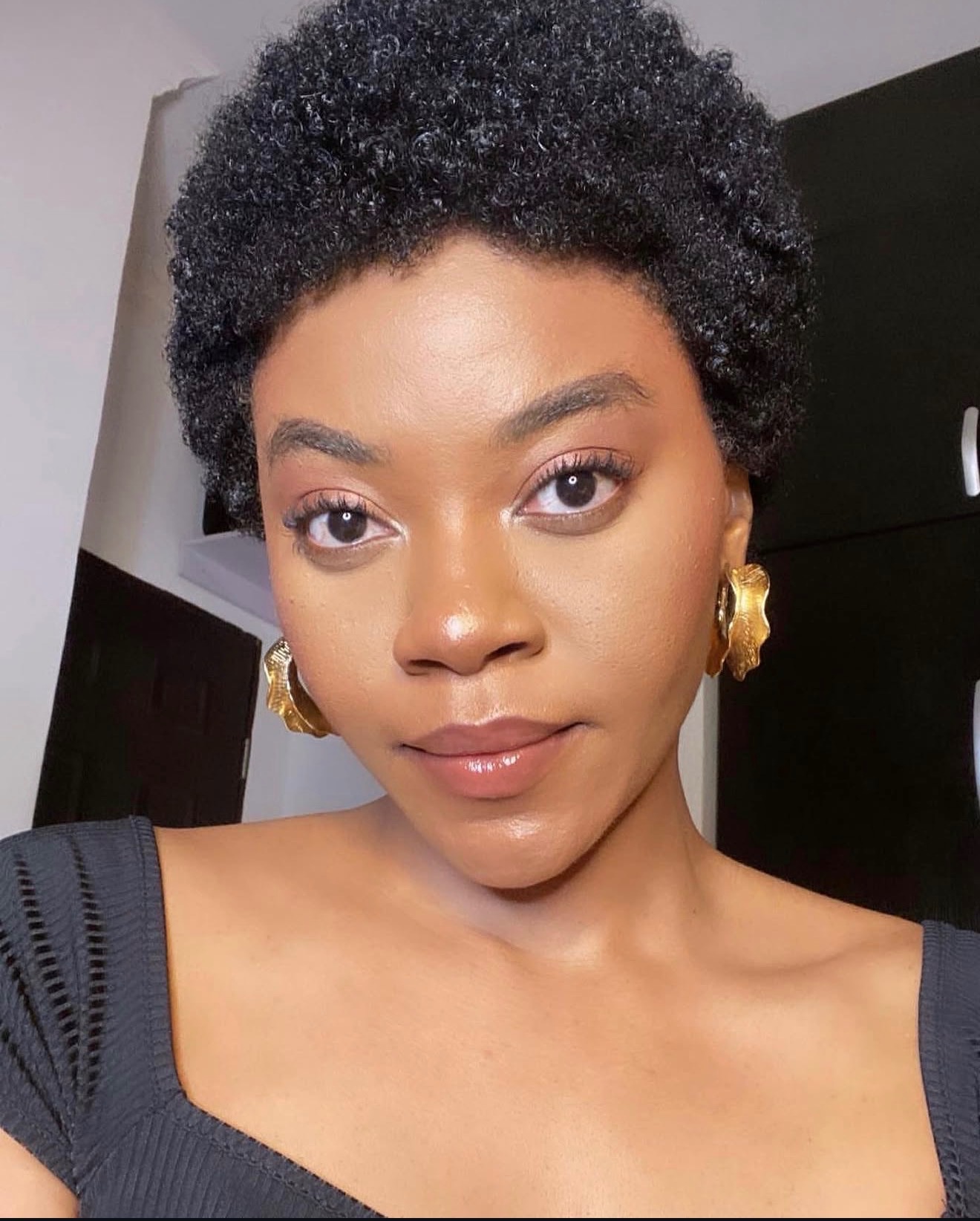 Daisy with a regrown TWA afro